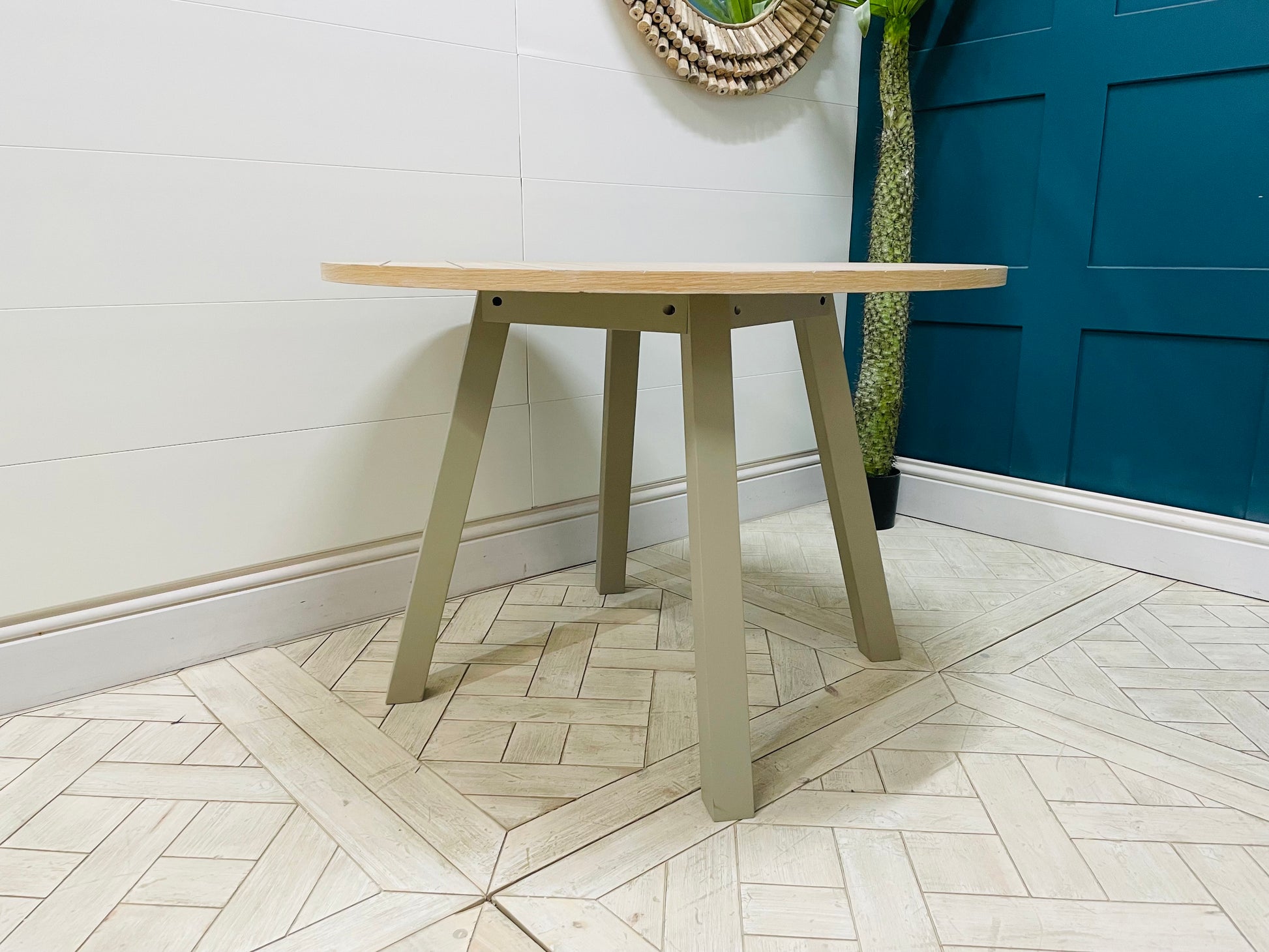 Gallery Direct Eton round dining table, light oak and grey Prairie finish.