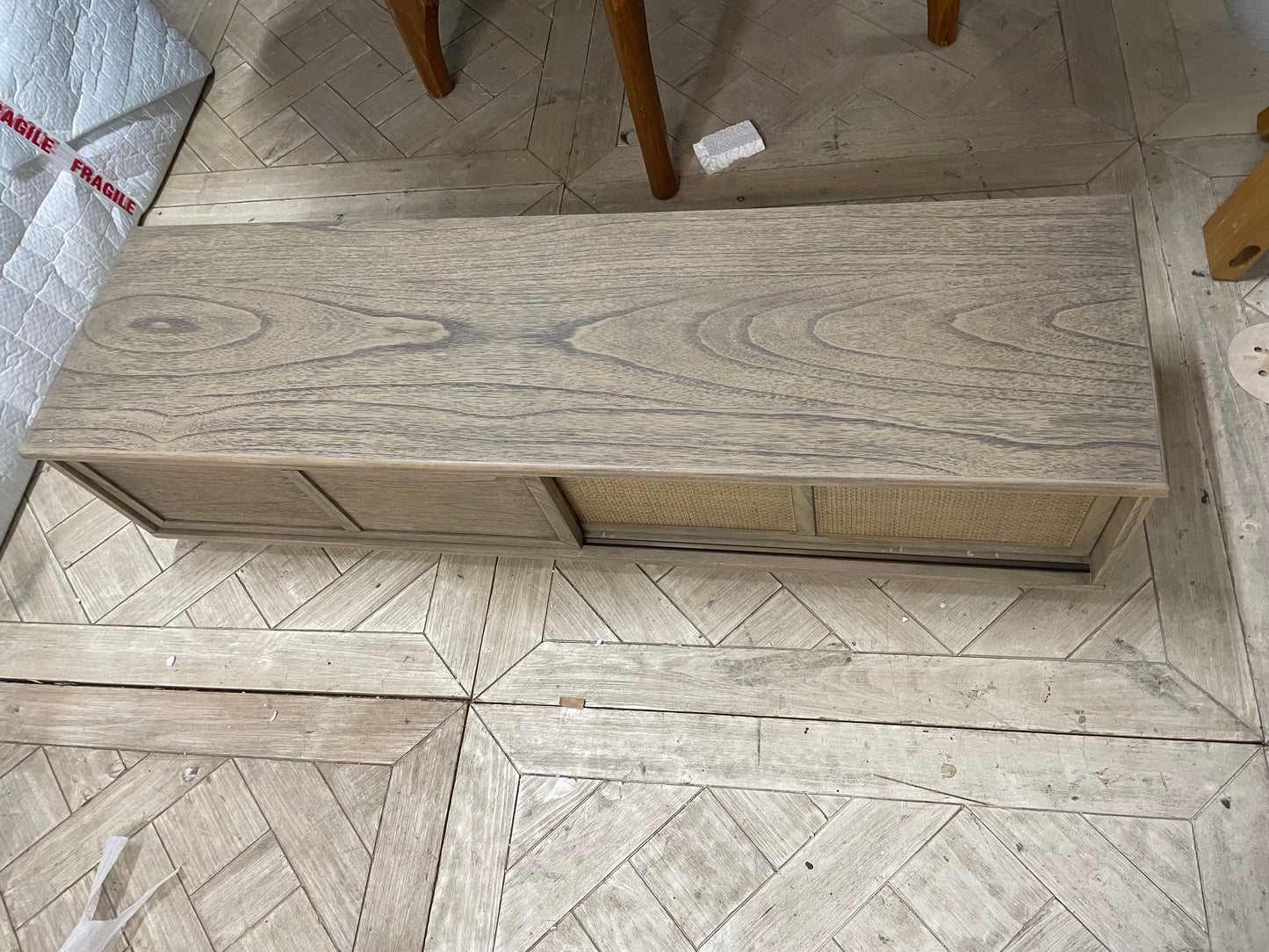 Gallery Direct Mustique textured light-wood 2-door media unit with parquet wood patterning and round metal handles