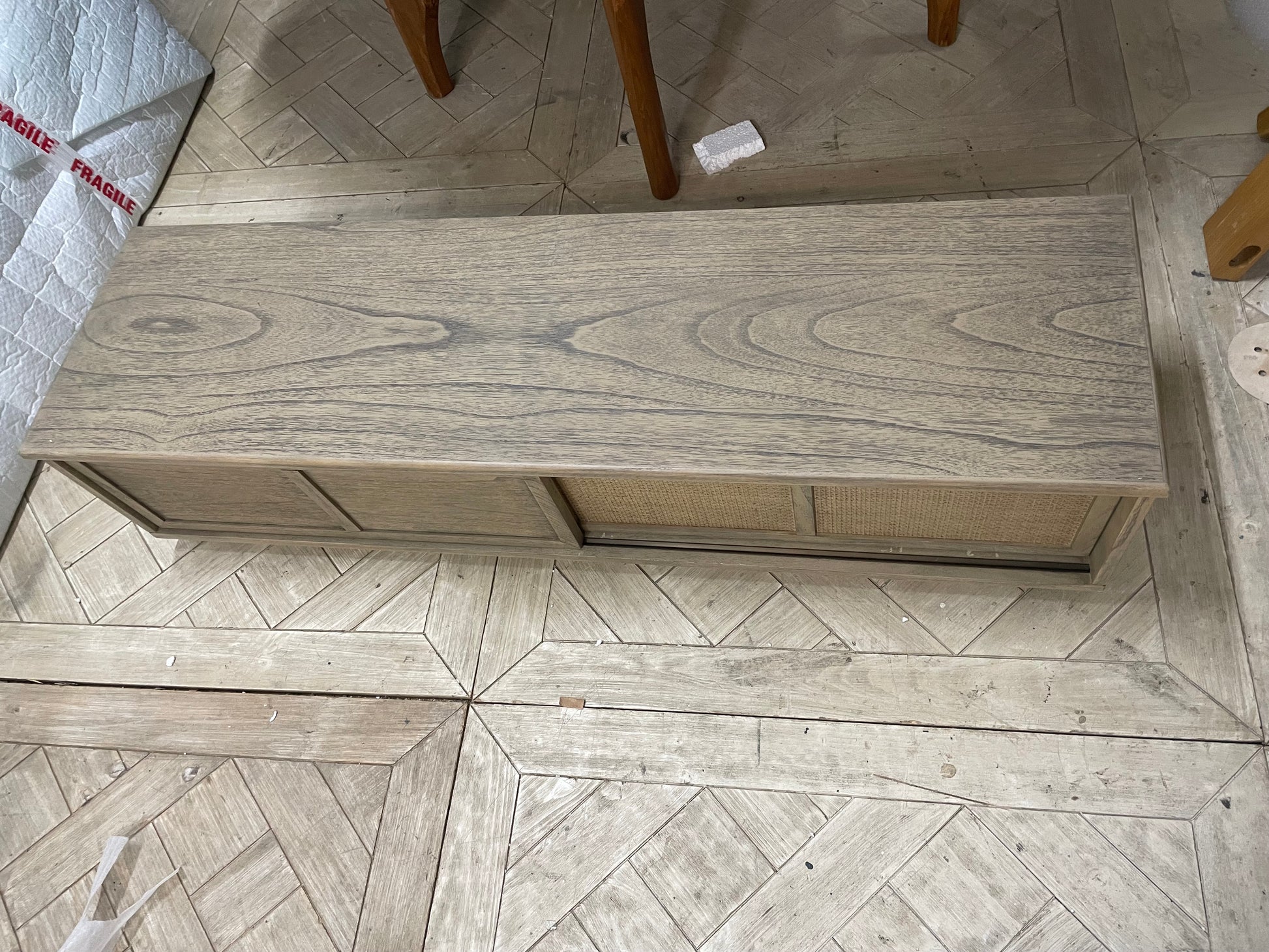 Gallery Direct Mustique textured light-wood 2-door media unit with parquet wood patterning and round metal handles
