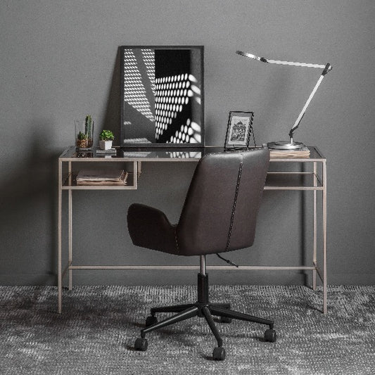 Gallery Direct Rothbury Desk in Silver with clear glass top and open storage shelves"