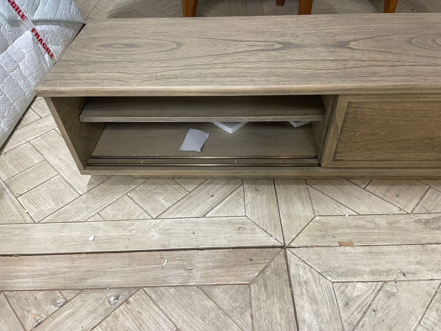 Gallery Direct Mustique textured light-wood 2-door media unit with parquet wood patterning and round metal handles