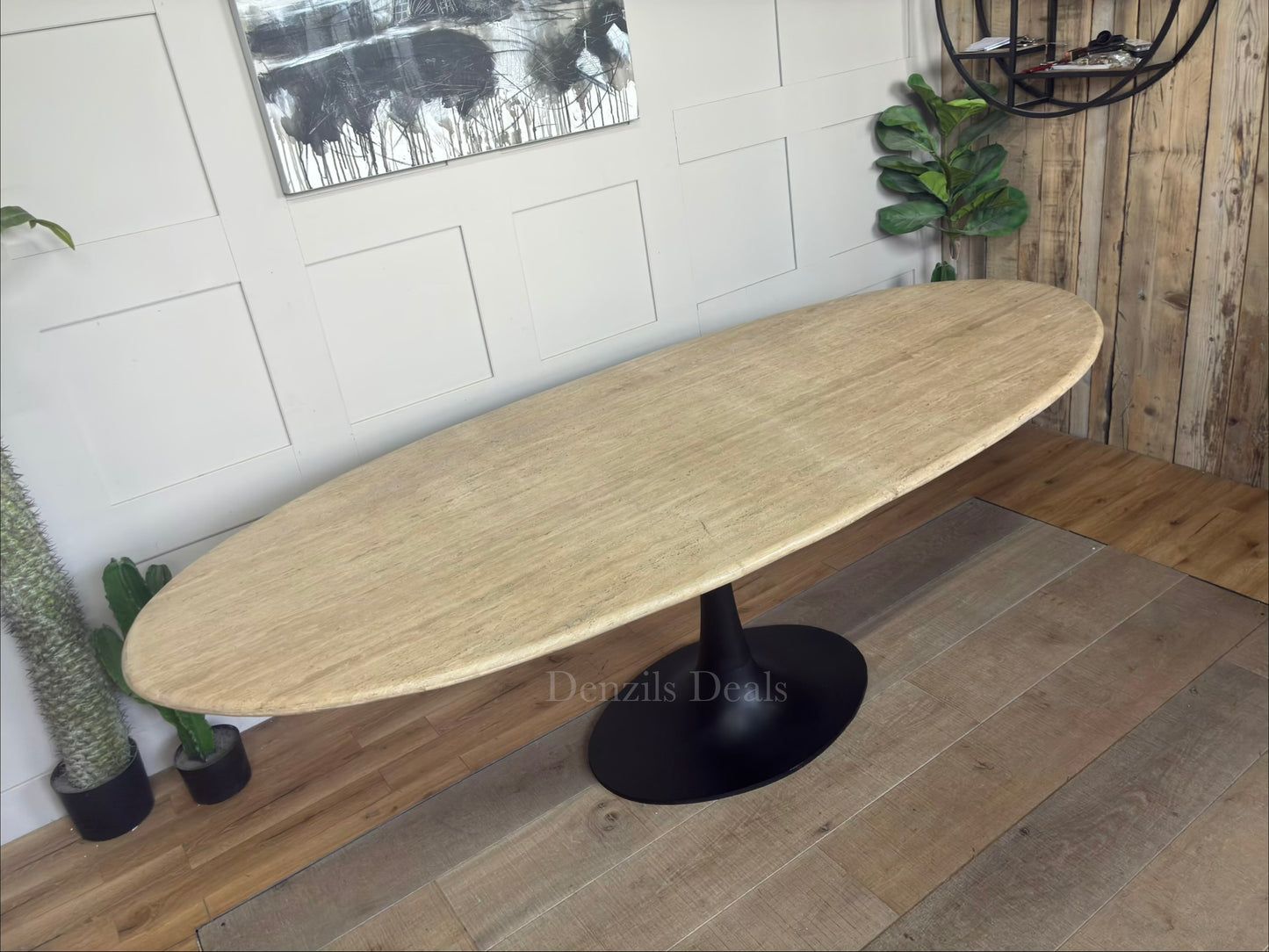 Hampton Oval Dining Table by Richmond Interiors with a beige travertine top and black metal base