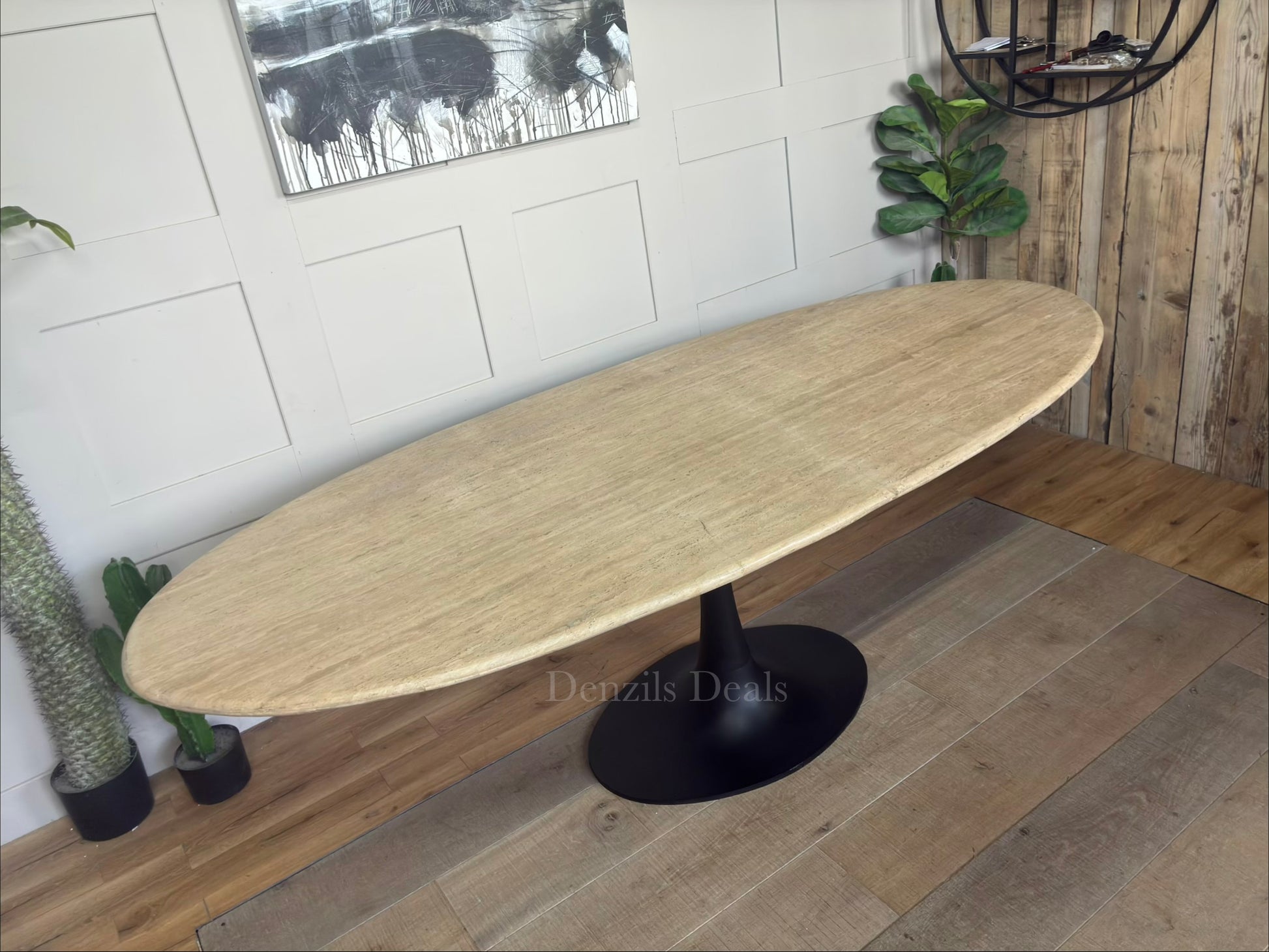 Hampton Oval Dining Table by Richmond Interiors with a beige travertine top and black metal base