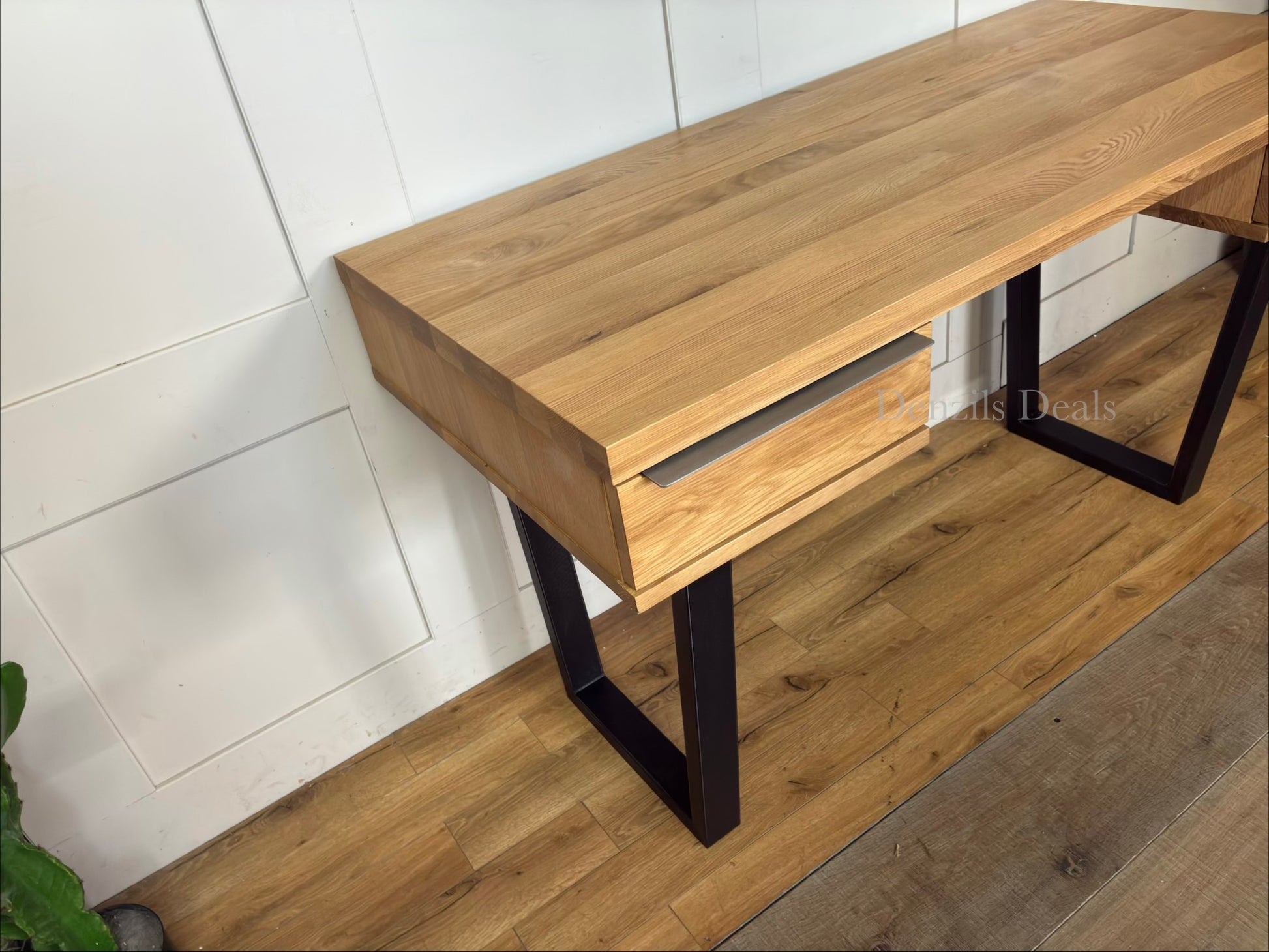 Industrial-style small oak desk with two drawers and black metal legs drawer close up