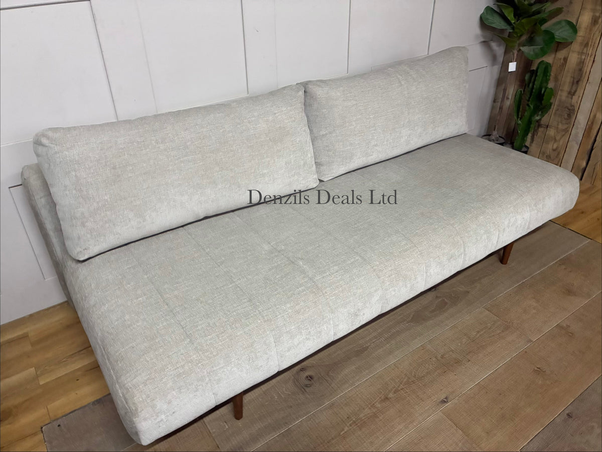 Close-up of the Innovation Living Avella Sand 280 upholstery fabric, showing a smooth, even, tightly woven polyester texture in a light sandy-beige tone.