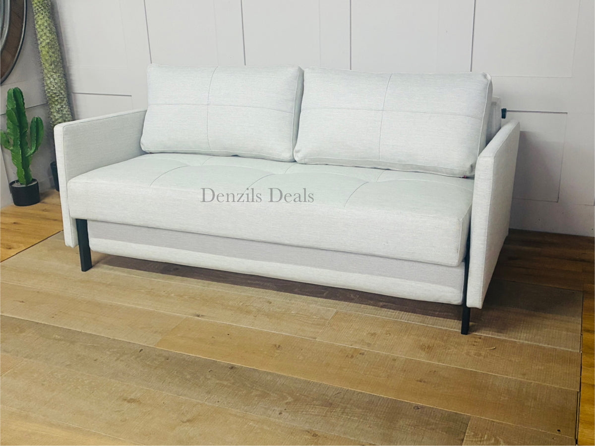 Modern 3-seater sofa bed with slim arms and oak legs, upholstered in a textured Mixed Dance Natural fabric. It folds out into a 160x200cm king-size sleeper with hidden bedding storage underneath