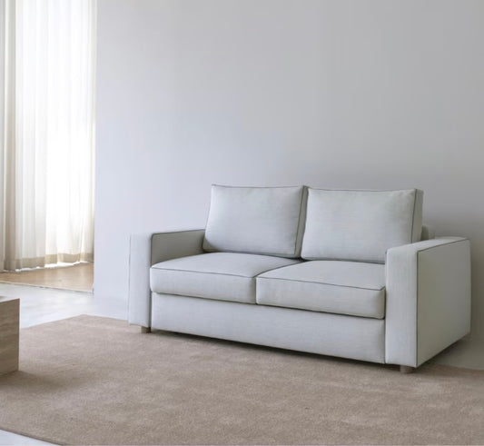 Innovation Living Neah 140 Sofa Bed in Natural fabric, featuring a minimalist Scandinavian design and compact frame.