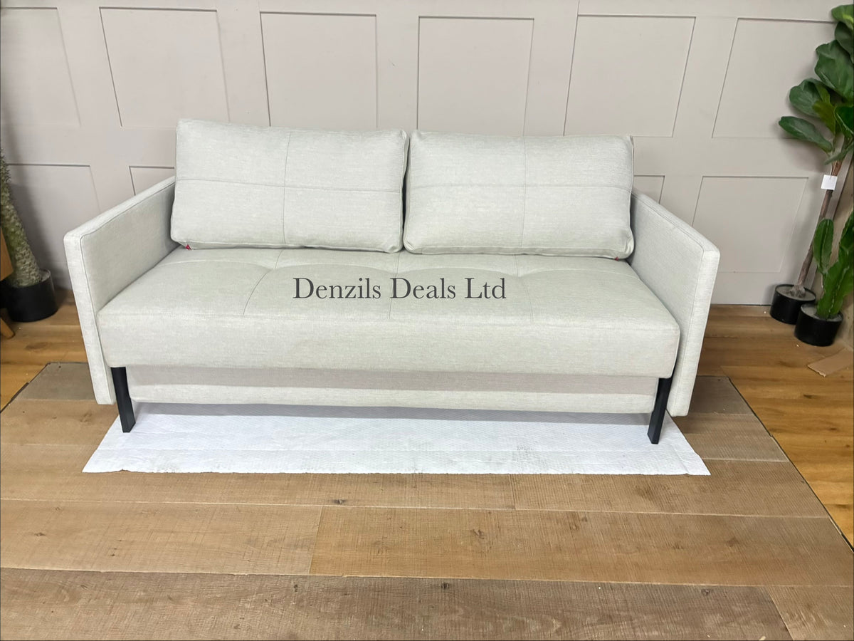 
Modern 3-seater sofa bed with slim arms and oak legs, upholstered in a textured Mixed Dance Natural fabric. It folds out into a 160x200cm king-size sleeper with hidden bedding storage underneath