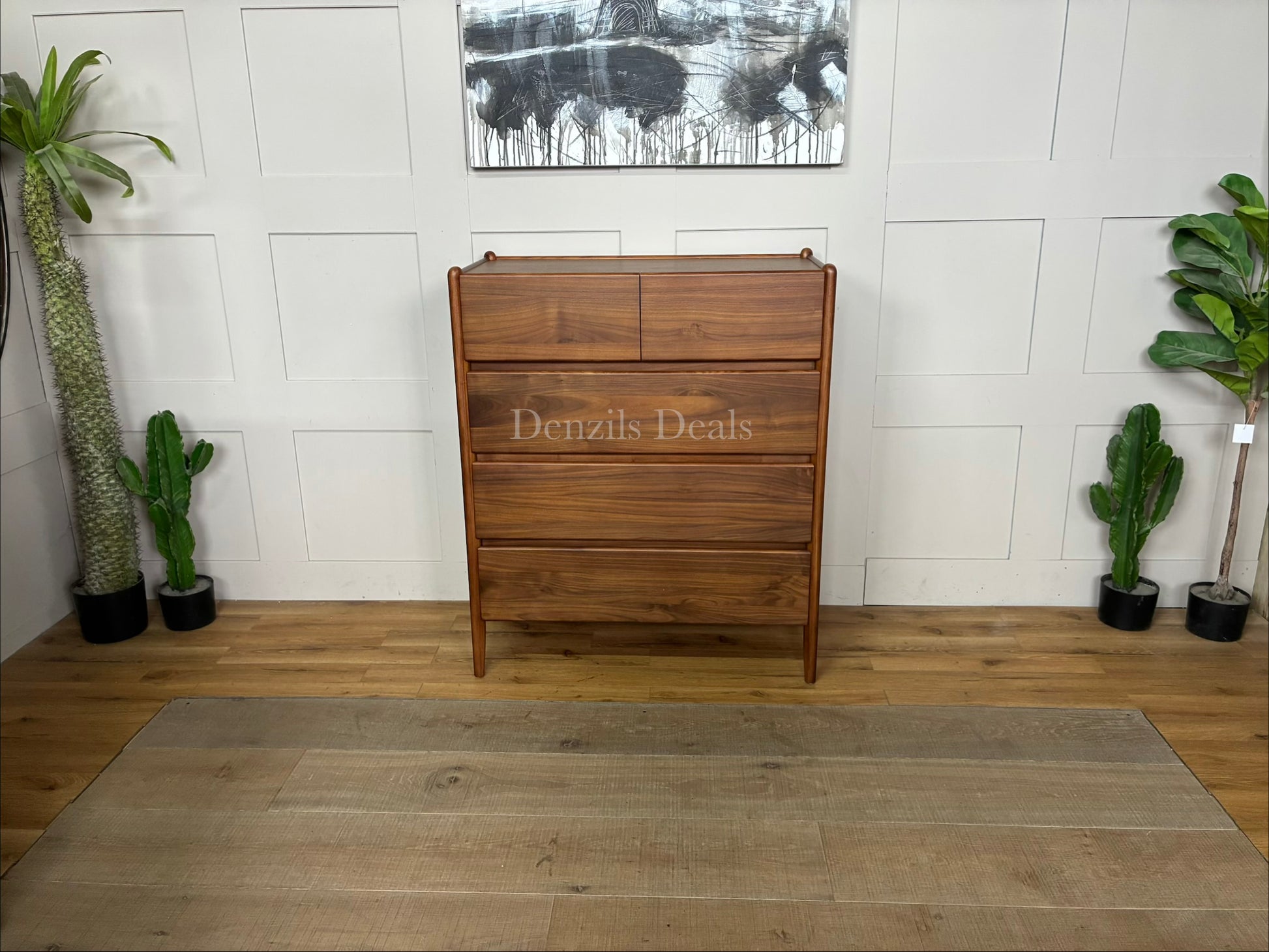 John Lewis Scandi 5 Drawer Wood Chest, Walnut Finish with five storage drawers and the top surface has a slight tray-edge design so your bedside essentials stay secure. Rounded posts, tapered legs and sleek