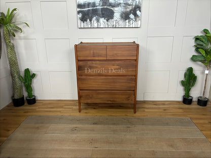 John Lewis Scandi 5 Drawer Wood Chest, Walnut Finish with five storage drawers and the top surface has a slight tray-edge design so your bedside essentials stay secure. Rounded posts, tapered legs and sleek