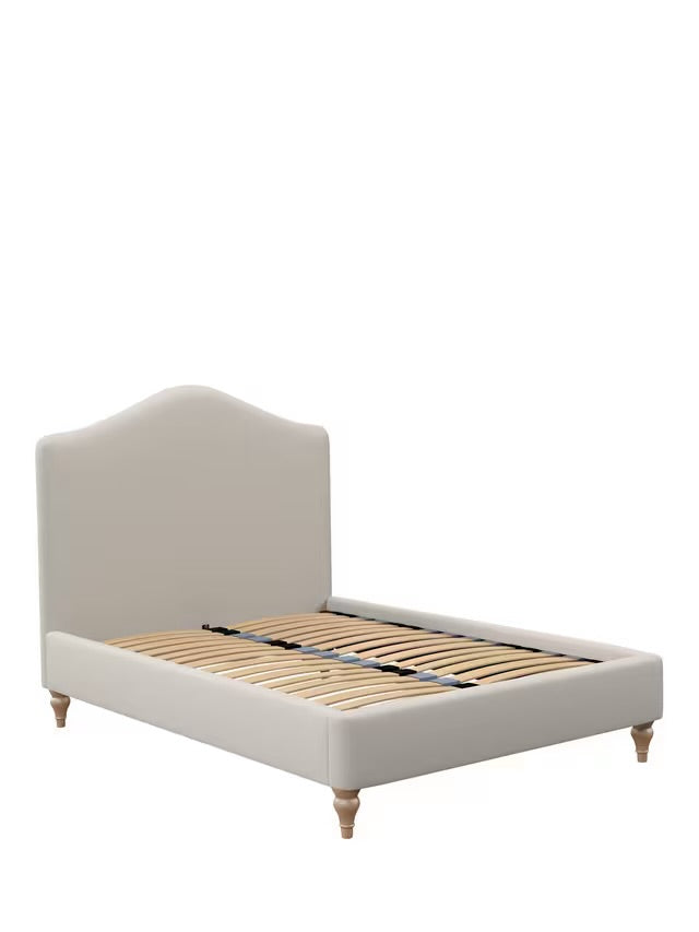 John Lewis Alice King Size bed frame upholstered in a beige woven fabric, featuring a softly curved, foam-filled headboard and turned light wooden legs.