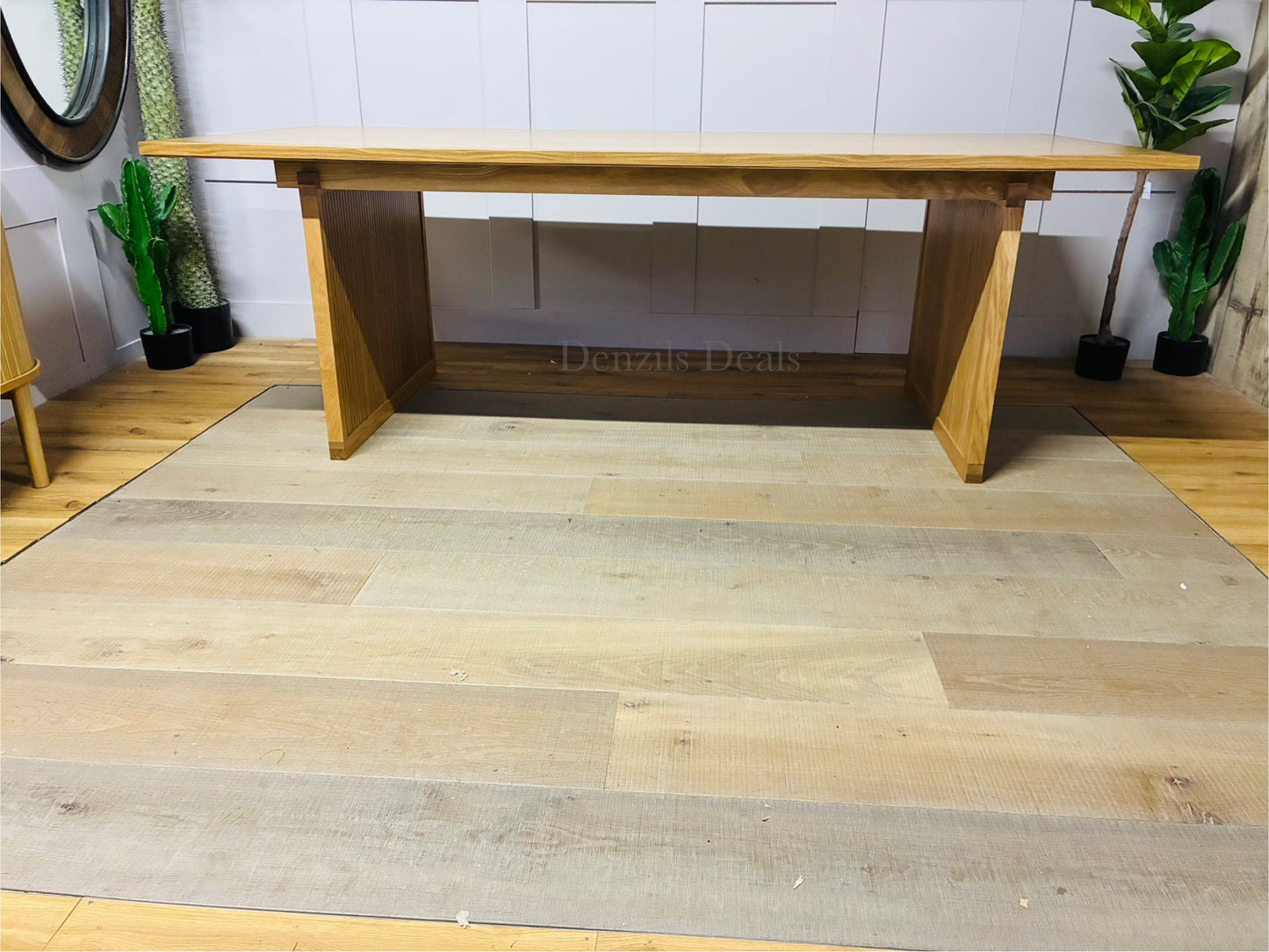 John Lewis Anders 8-seater rectangular dining table in natural solid oak with a Scandi-style design, featuring distinctive groove details on the legs and a 220cm long tabletop with visible grain