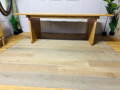 John Lewis Anders 8-seater rectangular dining table in natural solid oak with a Scandi-style design, featuring distinctive groove details on the legs and a 220cm long tabletop with visible grain