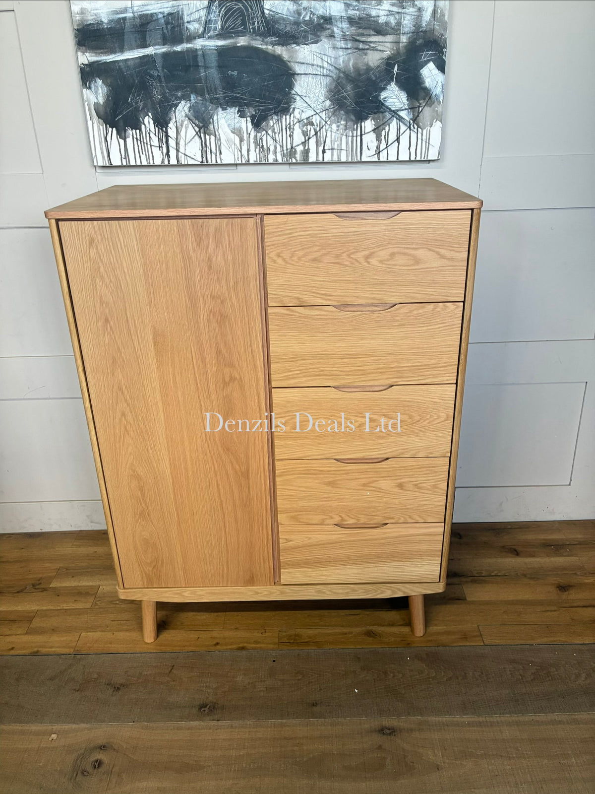 John Lewis Bow 5-drawer low wardrobe in natural oak wood.