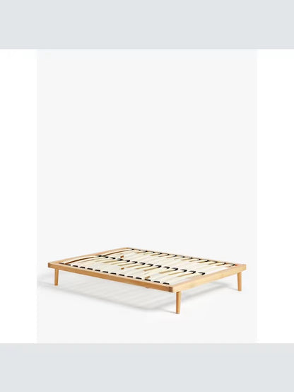 John Lewis Bow double platform bed frame in natural oak, showing the minimalist, low-profile wooden structure and sprung slatted base."