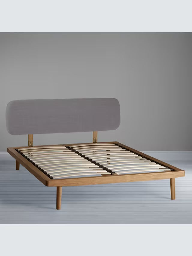 A king-size John Lewis Bow oak wooden bed frame featuring a light grey upholstered fabric headboard with a clean, modern design