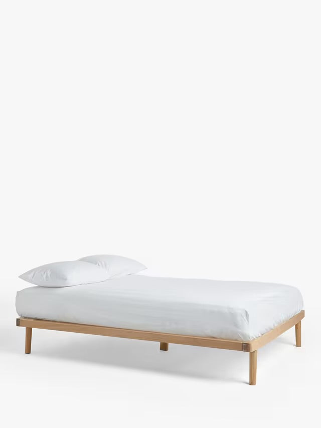 John Lewis Bow platform bed frame in double size, featuring a light solid oak and oak veneer finish with rounded corners