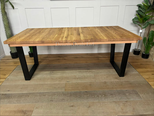 John Lewis Calia 8-10 Seater Extending Dining Table in natural solid oak with a rustic slatted wood top and a black welded iron base