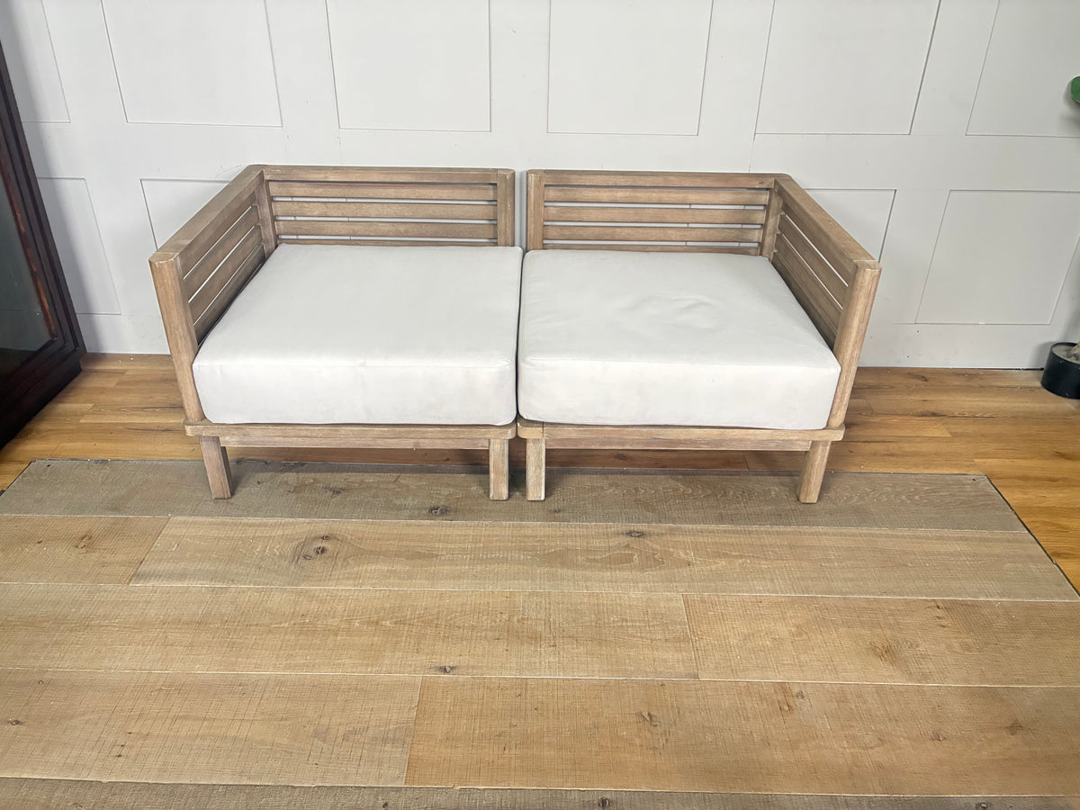 John Lewis Coast garden corner unit chair made of weather-resistant eucalyptus wood with a light brushed finish and plush beige seat and backrest cushions