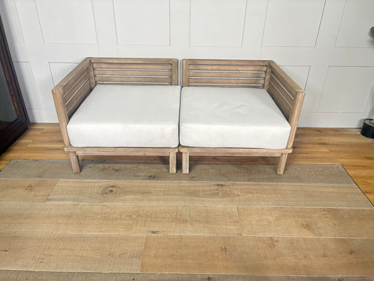 John Lewis Coast garden corner unit chair made of weather-resistant eucalyptus wood with a light brushed finish and plush beige seat and backrest cushions