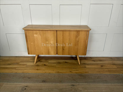 John Lewis Greenwood 2-door sideboard made from solid oak with a light Bianco oil finish.