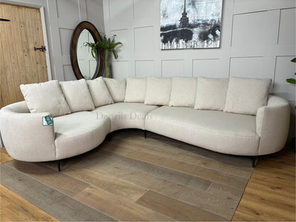 John Lewis Lozenge left-hand facing corner sectional sofa in textured putty-beige twisted boucle fabric with organic curved seating and soft pillow back cushions.