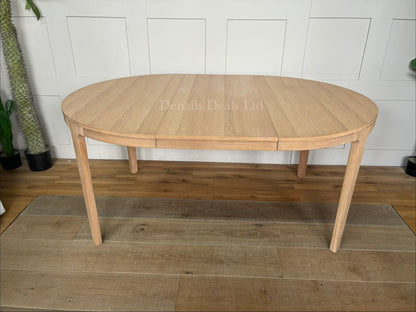 John Lewis Mira II Extending Round Dining Table, Oak finish.