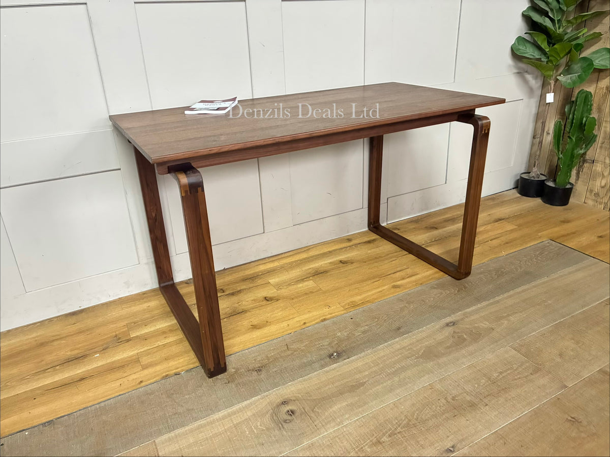 John Lewis Orbit Desk, Walnut  featuring A warm, deep brown walnut finish showcasing organic wood grain variations across the entire surface.