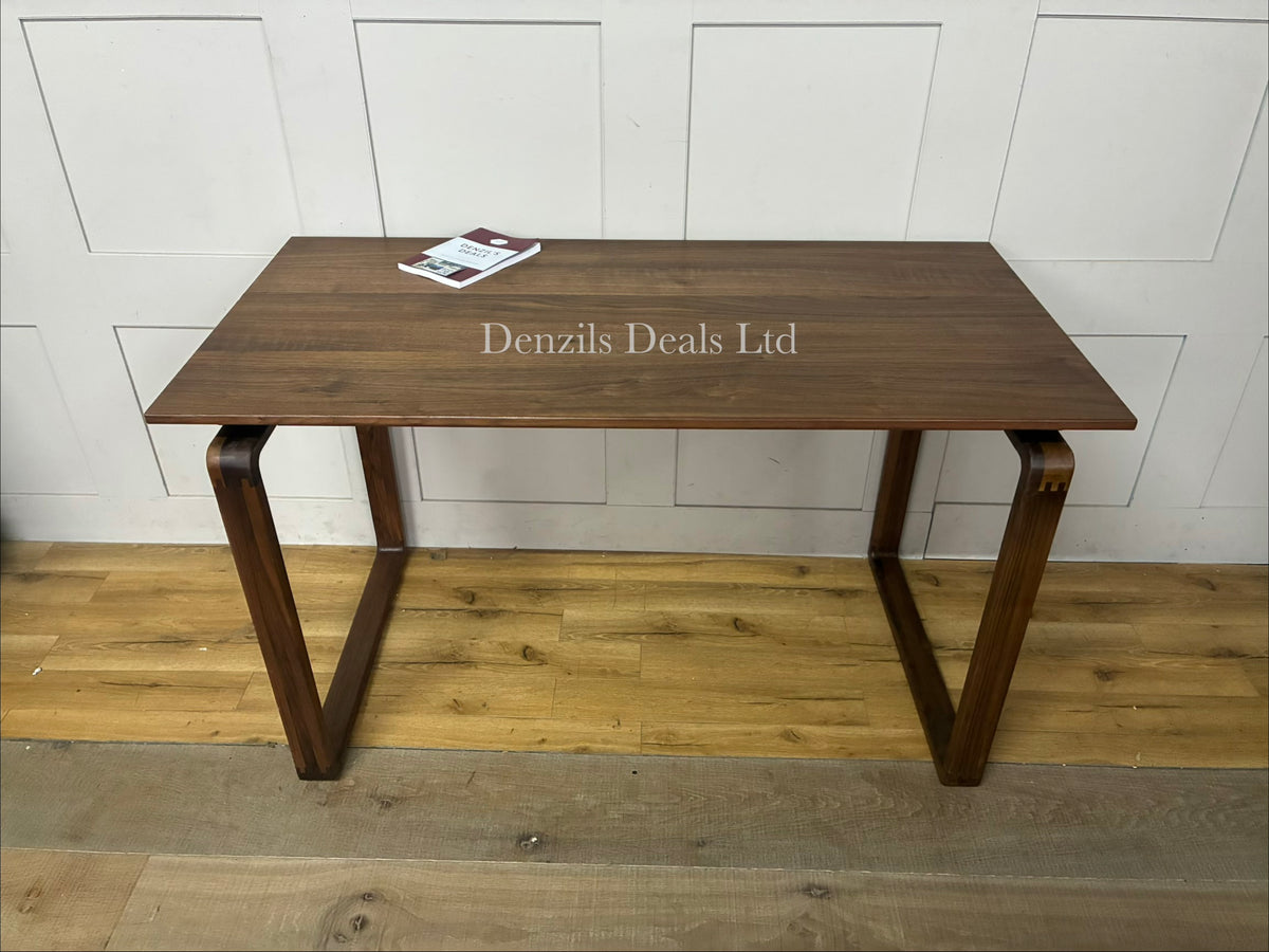 John Lewis Orbit Desk, Walnut showing A smooth, spacious rectangular desktop with soft, rounded corners and exposed finger-joint details at the corners, highlighting its traditional cabinet-maker craftsmanship
