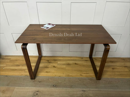 John Lewis Orbit Desk, Walnut showing A smooth, spacious rectangular desktop with soft, rounded corners and exposed finger-joint details at the corners, highlighting its traditional cabinet-maker craftsmanship