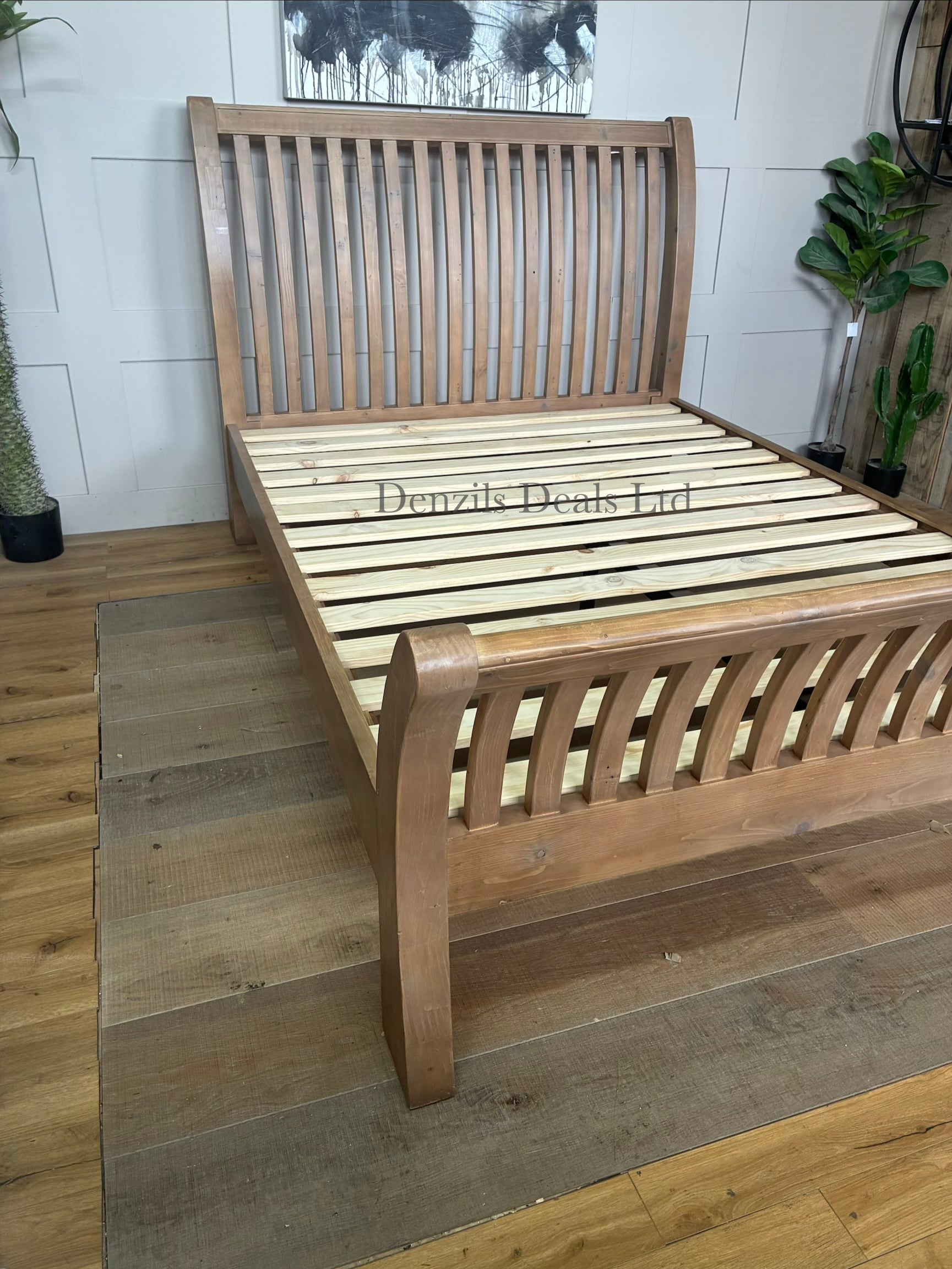 John Lewis Reclaimed Timber Bed Frame, King Size, Natural Wood featuring a charming, natural aesthetic thanks to its slatted design and shapely frame with a solid slats in the base that provide a supportive