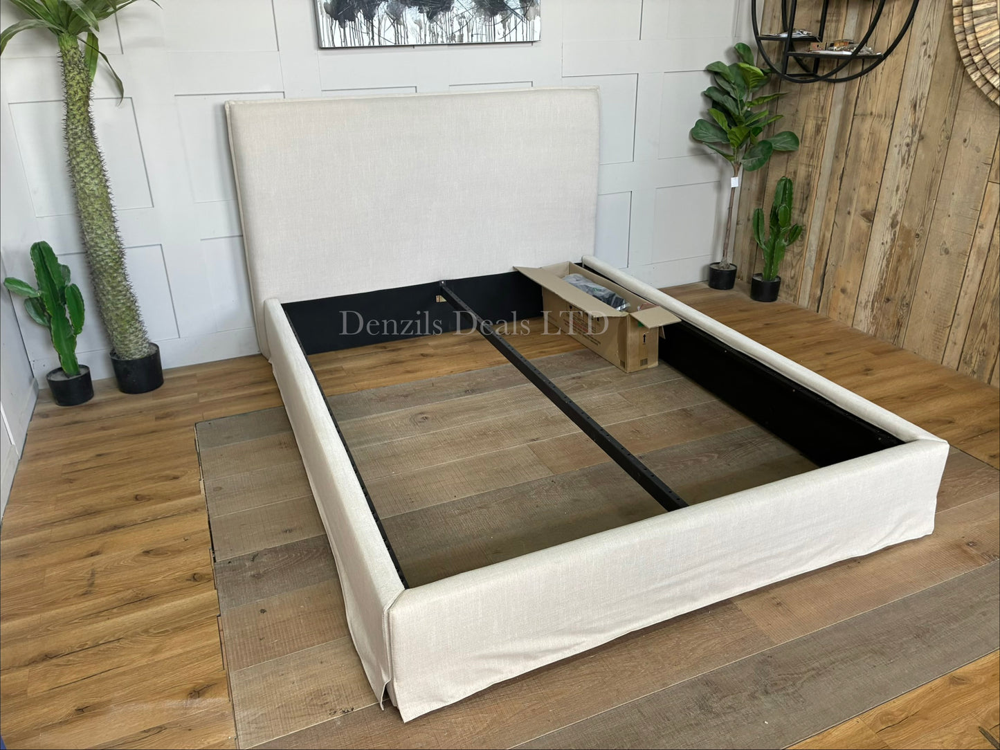 John Lewis Relax Rustic king-size bed frame in natural beige fabric, featuring a large padded headboard with loose-fitting upholstery