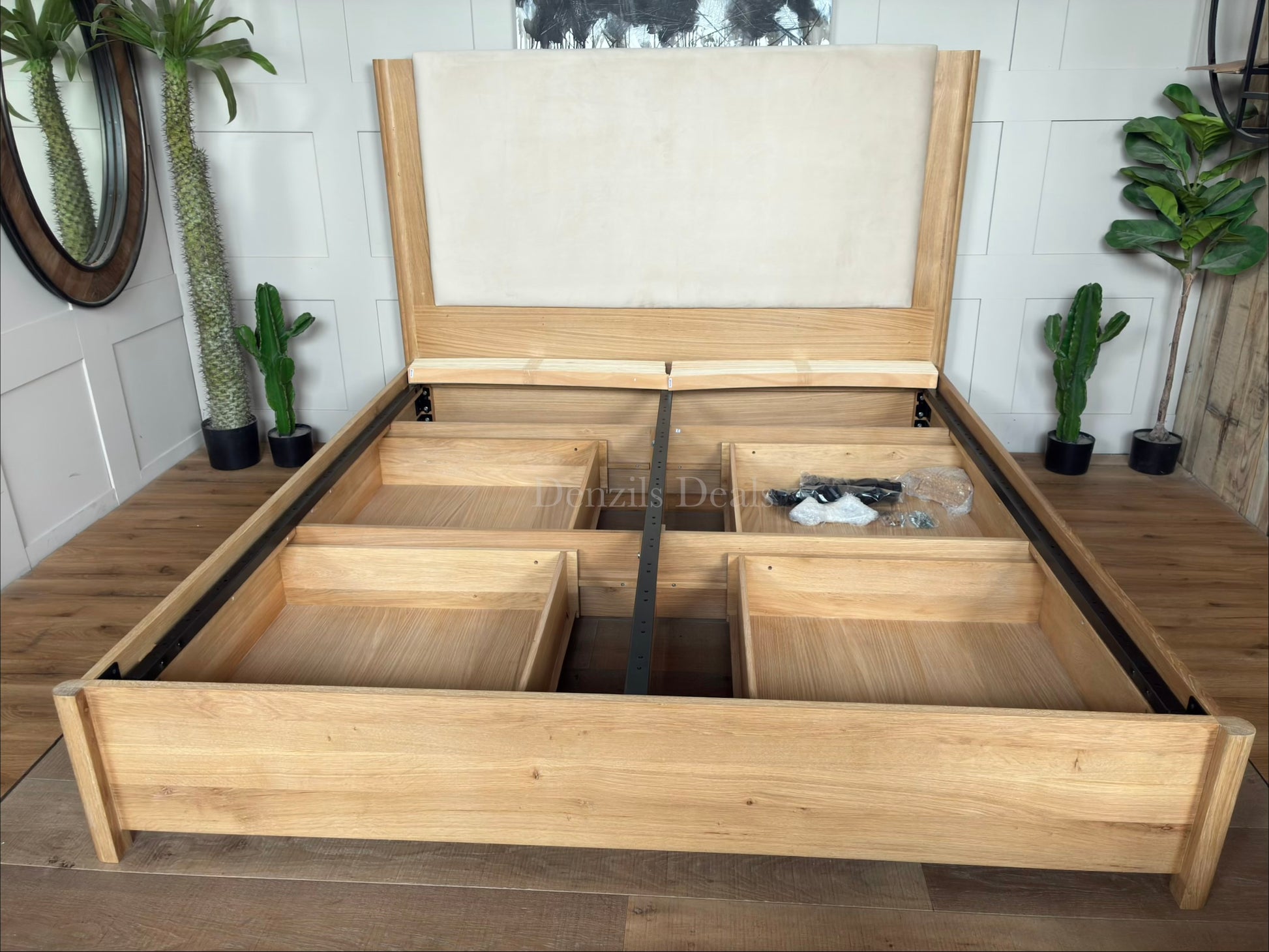 John Lewis Rest 4-drawer super king bed frame in natural wood."