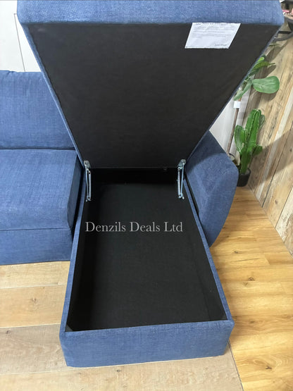 The John Lewis Sansa sofa bed, showing hidden storage and fully extended into a large double bed, showing the main section pulled out alongside the stationary chaise section to form a wide, flat foam mattress sleeping area.