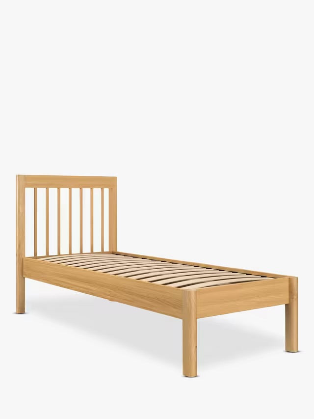John Lewis Spindle Bed Frame, single, in Natural Oak with slatted headboard and rounded edges.