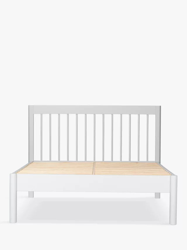 Modern spindle-style double bed frame from John Lewis in light wood tone