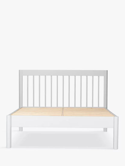 Modern spindle-style double bed frame from John Lewis in light wood tone