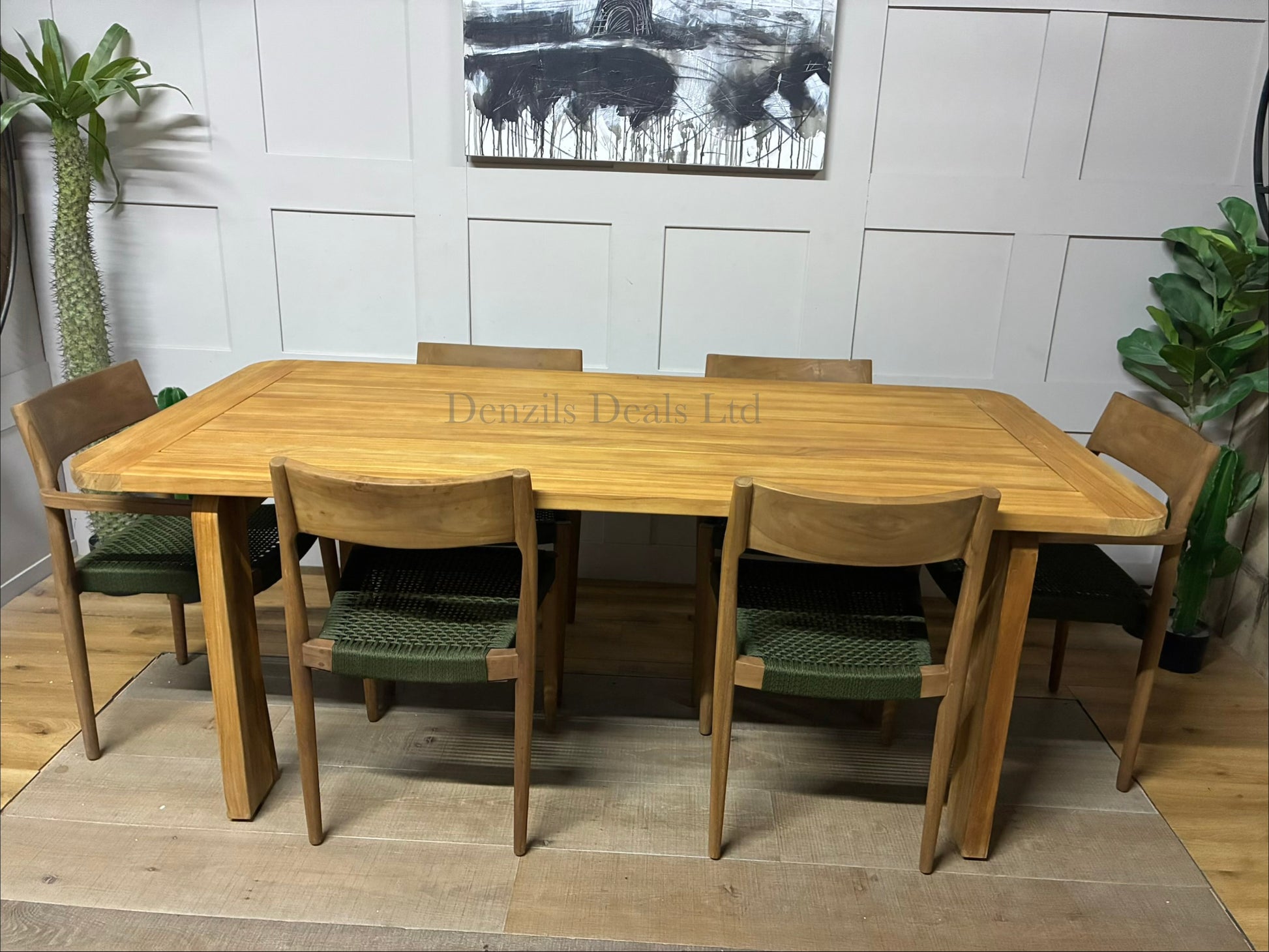 John Lewis Terra rectangular garden dining table with a weather-resistant teak wood frame and gently curved edges, set outdoors on a wooden deck
