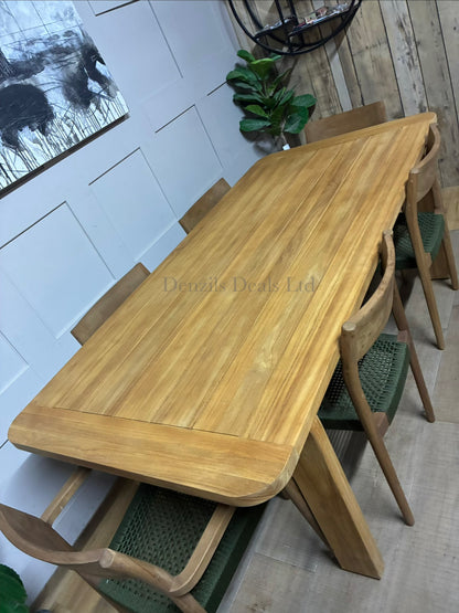 John Lewis Terra teak wood garden table and 6 chairs on a sunlit patio