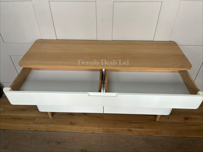 John Lewis modern Scandinavian-style wide sideboard featuring a matte white cabinet body, two doors, and a natural solid oak top surface with matching tapered wooden legs.