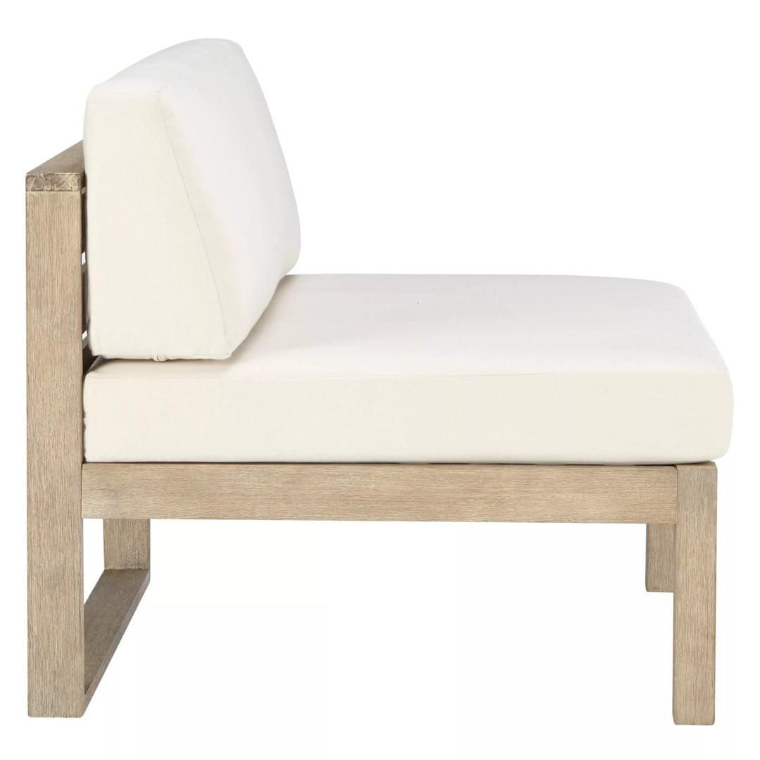An outdoor corner and modular chairs from the John Lewis St Ives collection, crafted from FSC-certified eucalyptus wood with a slatted back, paired with plush, water-resistant seat and back cushions
