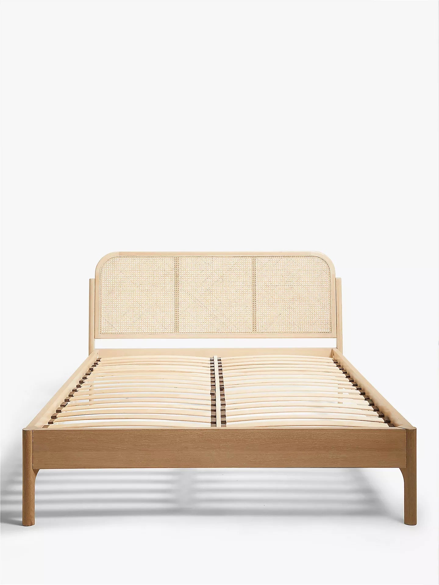 John Lewis super king size bed frame in natural oak with a curved, airy cane rattan headboard and solid slatted base.
