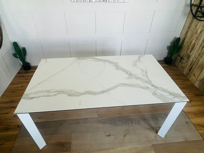 John lewis Modern white rectangular dining table with a smooth ceramic top and a lacquered metal frame, seating up to 6 people.