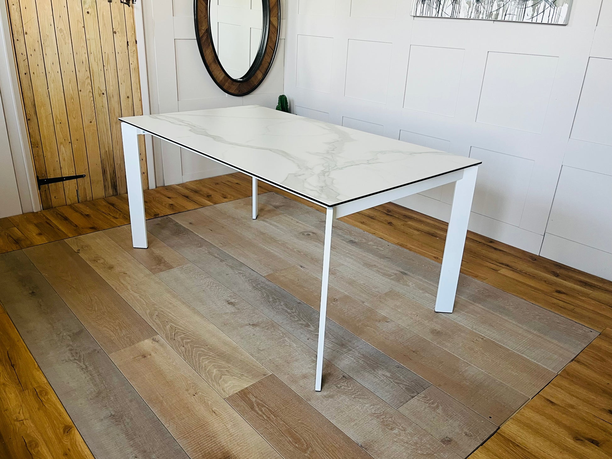 John lewis Modern white rectangular dining table with a smooth ceramic top and a lacquered metal frame, seating up to 6 people.