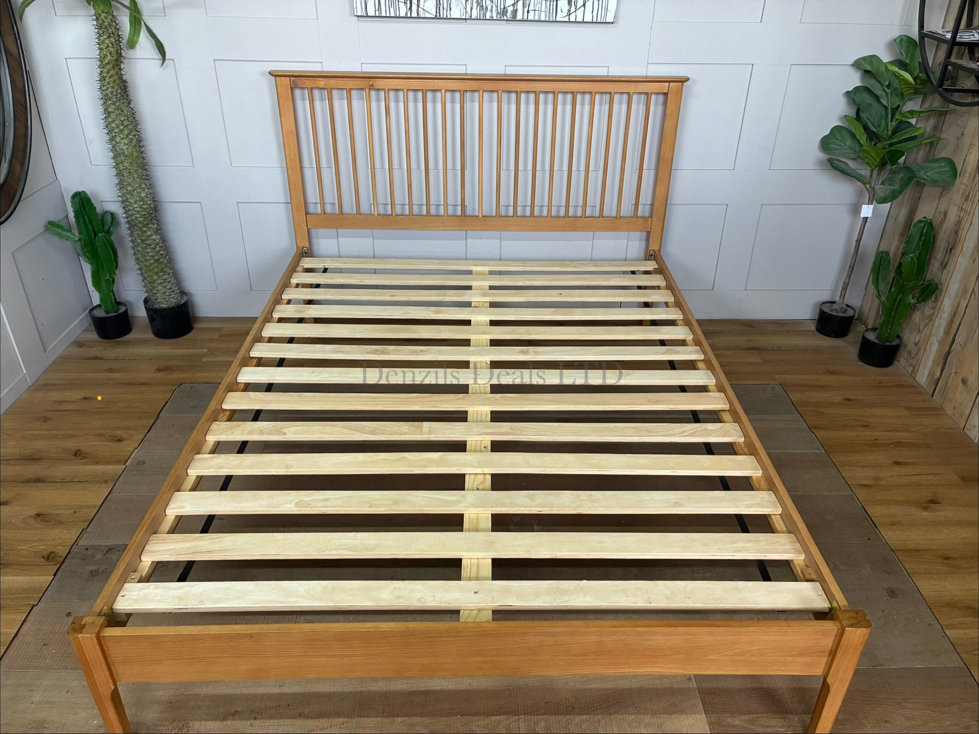 Julian Bowen Cotswold king-size bed frame in natural satin-lacquered oak.