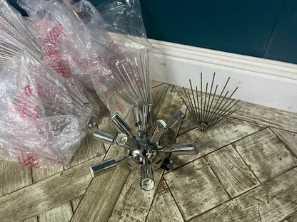 Kelly Wearstler Strada medium flush ceiling fixture in a polished nickel finish with delicate sculptural metal quills Neiman Marcus.