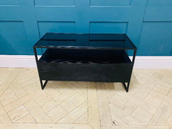 Made.com Kilby compact TV stand in black stain mango wood with a smoked glass top and single drawer