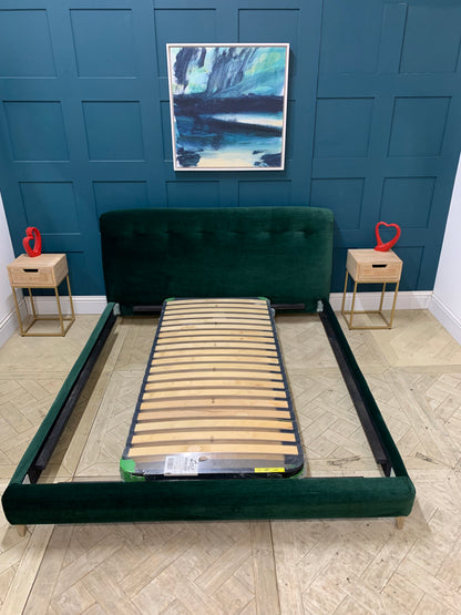 LOAF Superking Slumbleton Bed in Christmas Tree Clever Velvet.  Superking size Slumbleton bed by Loaf, upholstered in "Christmas Tree" dark green Clever Velvet. It features a tall, slightly angled headboard with soft, rounded edges and a slatted base.