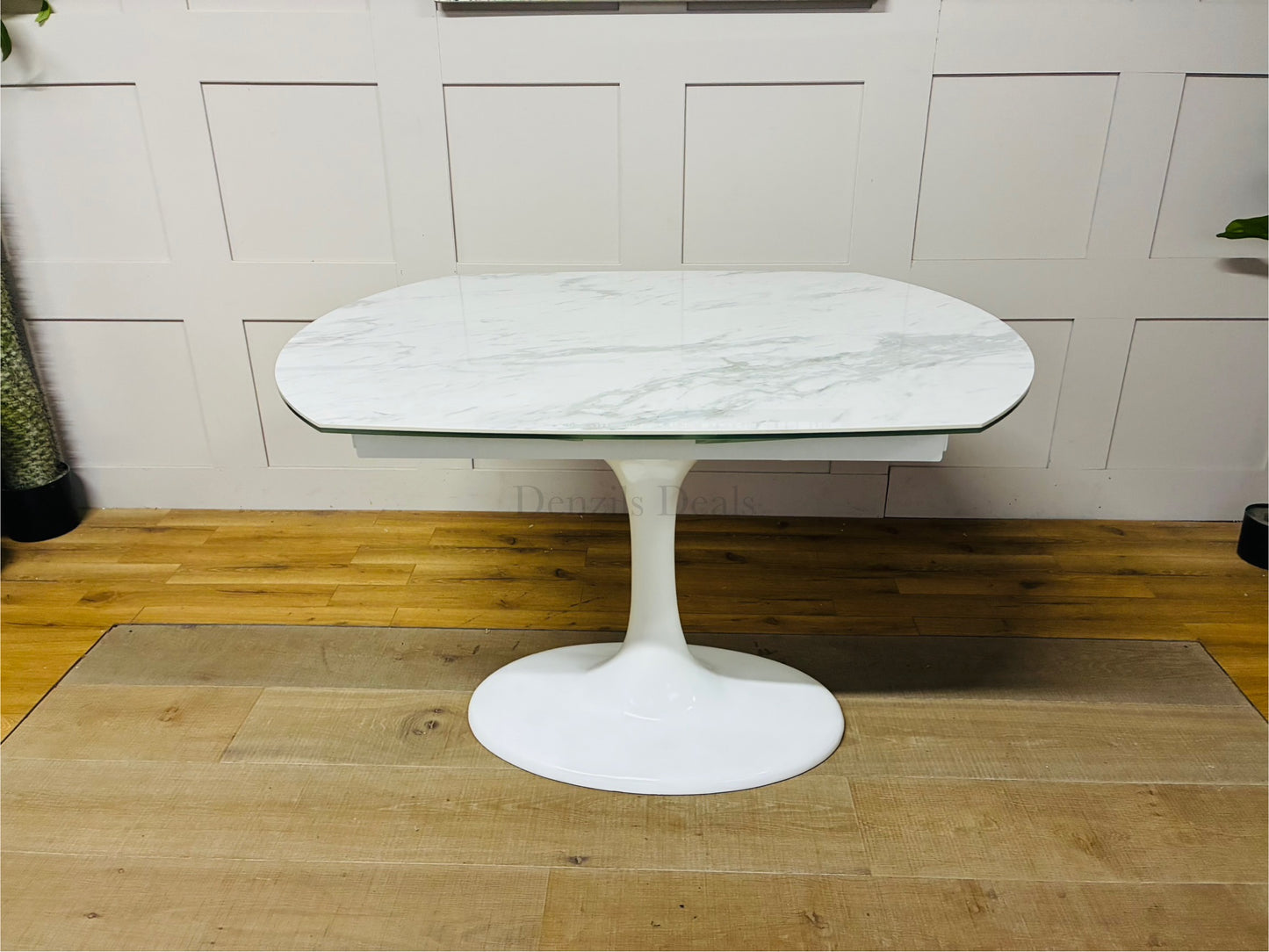 Dwell Lille white ceramic dining table with marble effect top and white tulip-style pedestal base, extended to seat 6