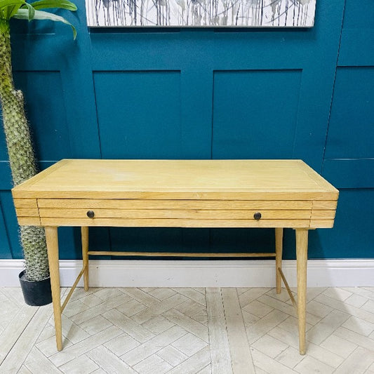 Loaf Clever Bubba Desk in natural oak with a drawer, styled in a minimalist home office setting